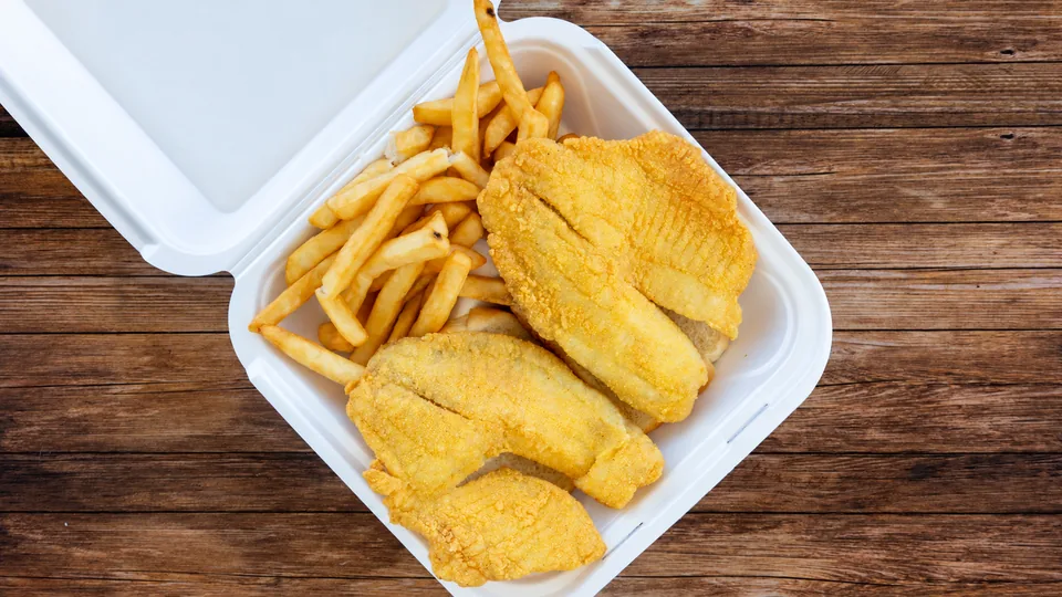 Breaded fish fillets and fries
